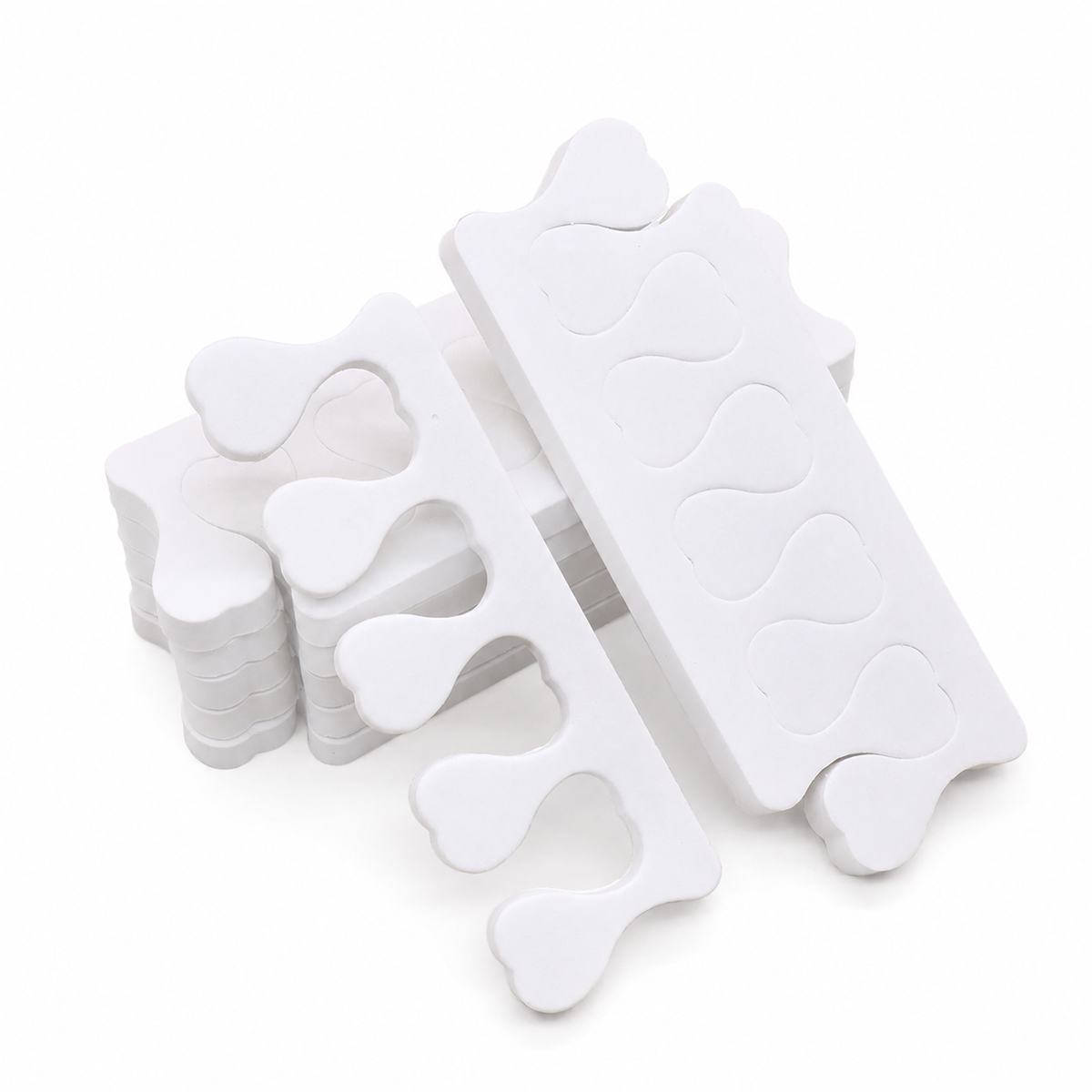 Pair of white foam pedicure toe separators
