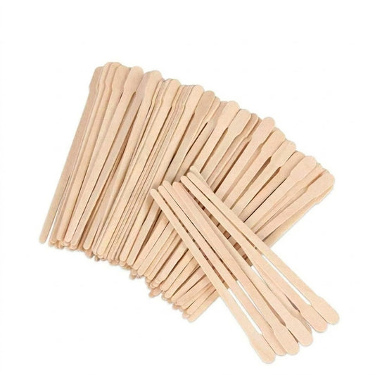 Small wooden spatulas fanned out