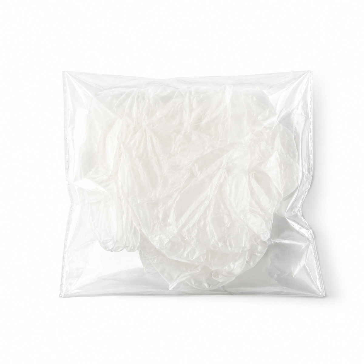 Single white vinyl glove