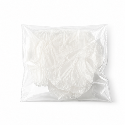 Single white vinyl glove