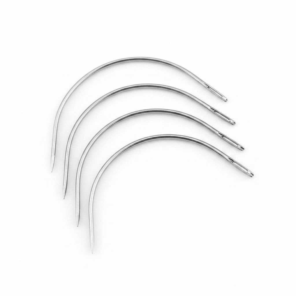 Close view of curved weaving needle eye and tip