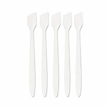 White spatulas fanned to show blade shape