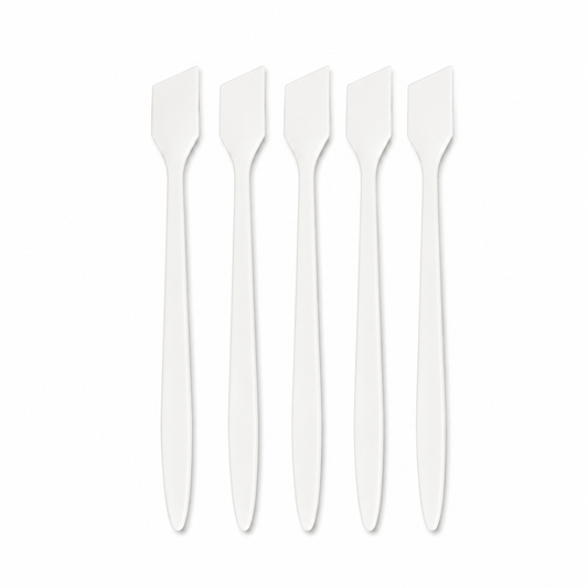 White spatulas fanned to show blade shape