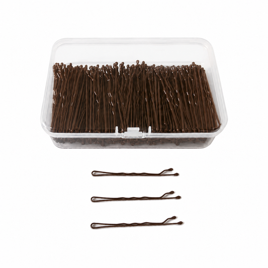 Loose bronze bobby pins showing rippled leg