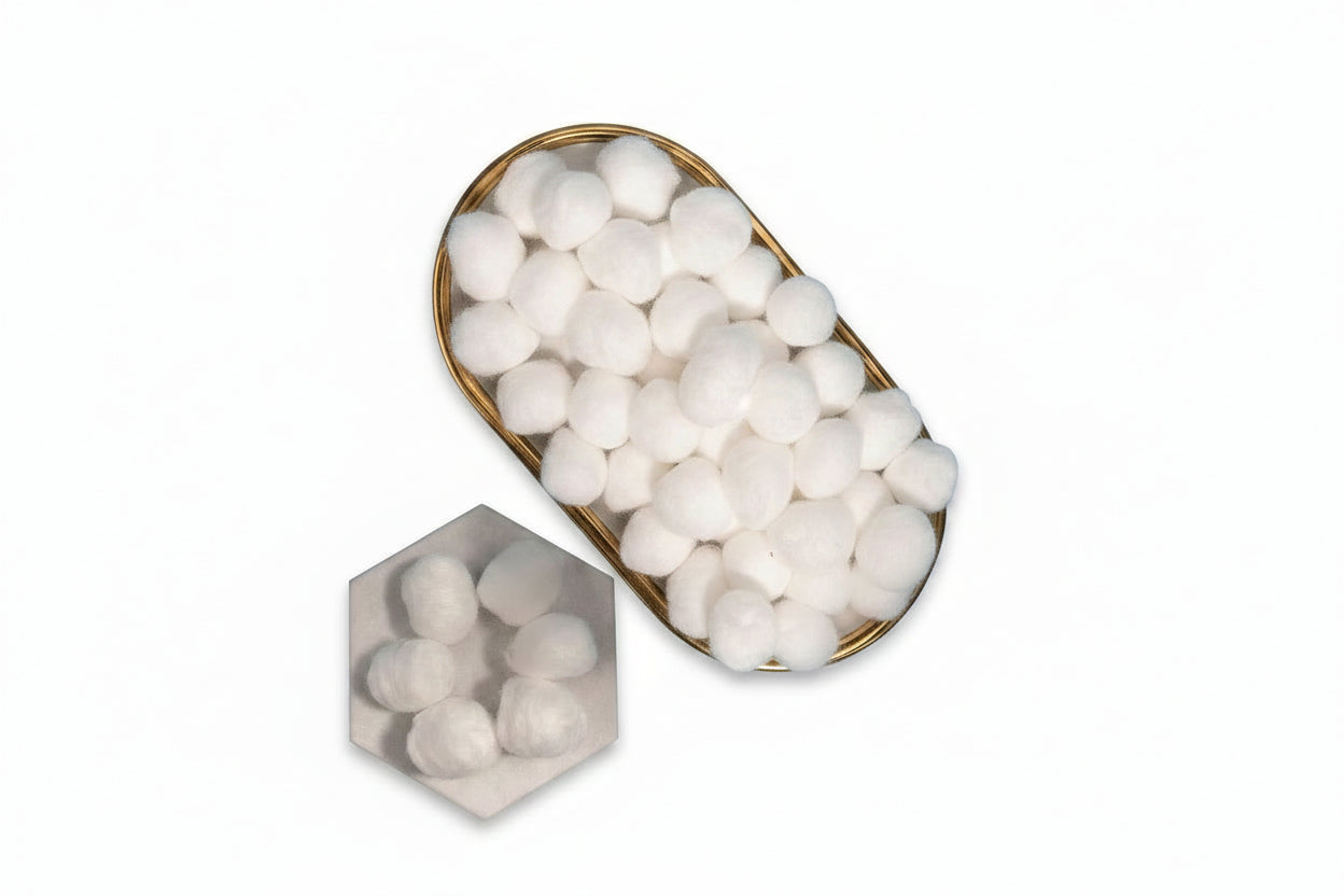 Loose cotton balls shown outside packaging