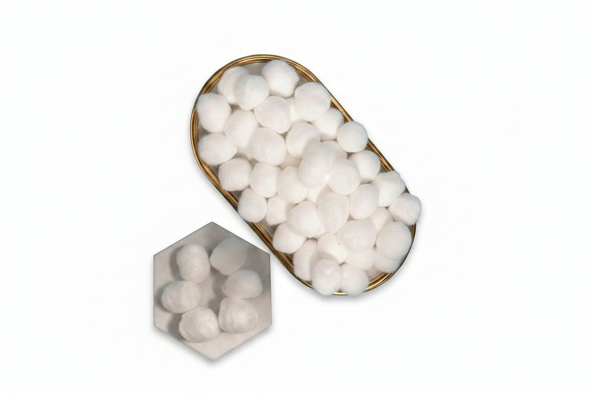 Loose cotton balls shown outside packaging