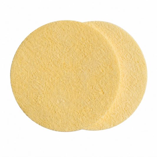 Cellulose sponge shown compressed flat
