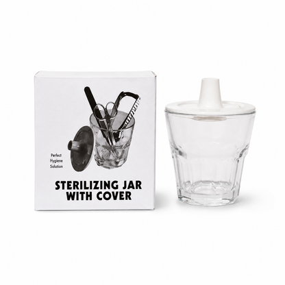 Glass sterilizing jar shown at an angle