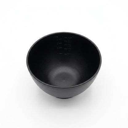 Flex mixing bowl shown squeezed to pour