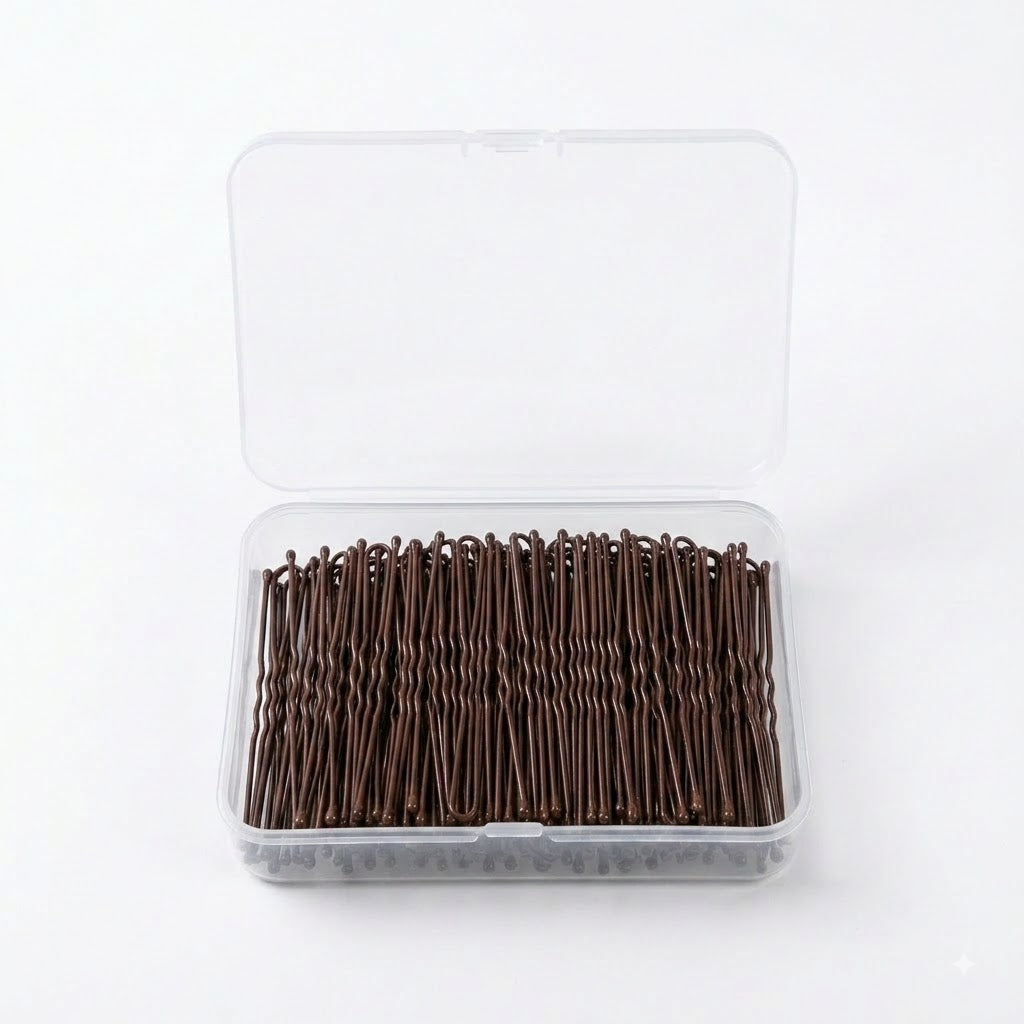 Long bronze hair pins in open box